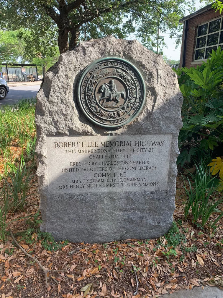 This photo provided by the city of Charleston, S.C. shows a historical marker honoring Robert E. Lee in Charleston, S.C. South Carolina's top lawyer and Charleston appear to be heading to court to figure out if the city broke a state law protecting Confederate memorials when it removed a marker commemorating a rebel general from the front lawn of a public school. The stone memorial calling the street outside the school the “Robert E. Lee Highway” was removed in July at the request of leaders at the Charleston Charter School for Math and Science in downtown Charleston, city officials said. (City of Charleston via AP)