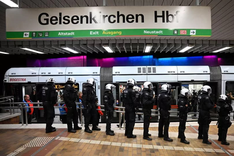 Riot police stand in Hauptbahnhof main railway station prior to the Group C England v Serbia match of the UEFA EURO 2024 football championship