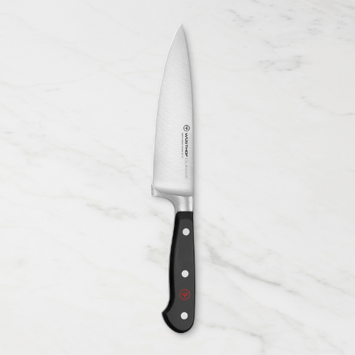 Wusthof classic chef knife laying on countertop