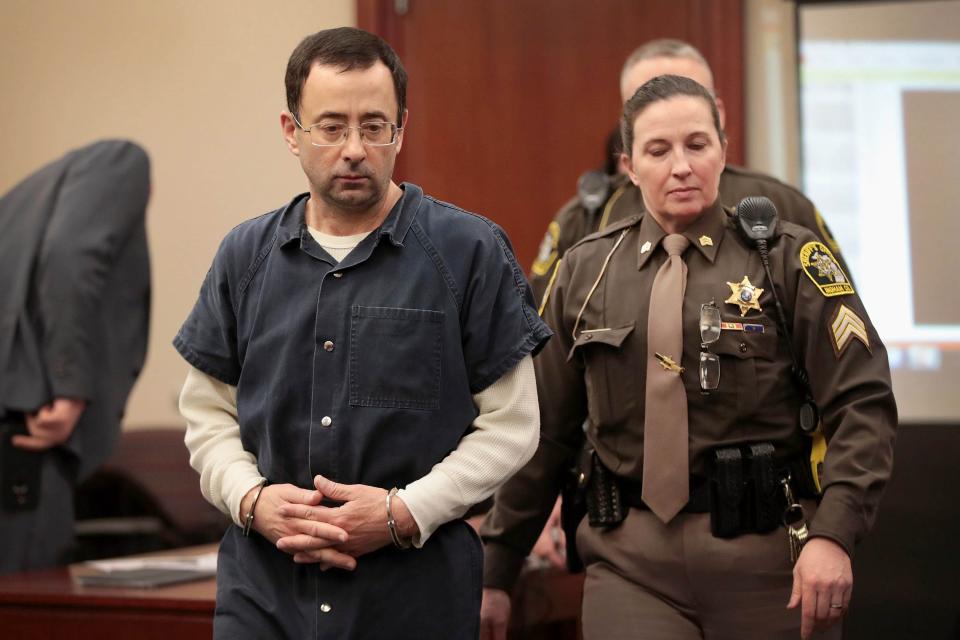 Larry Nassar appears in court on to listen to victim-impact statements prior to being sentenced on January 16, 2018 in Lansing.