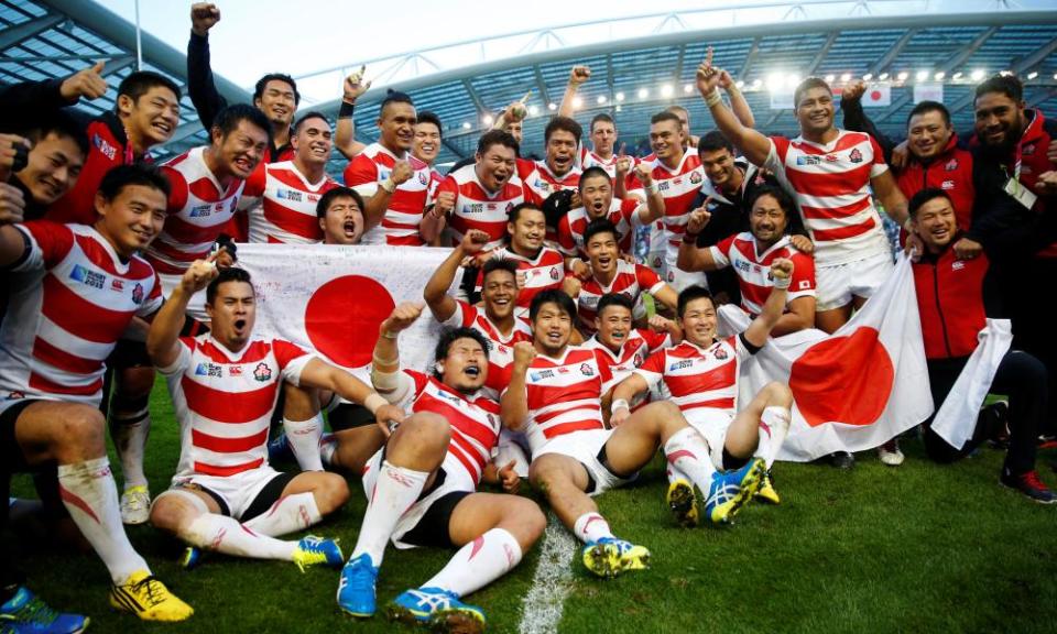 Japan players celebrate their victory over South Africa in the 2015 World Cup, arguably the biggest shock the tournament has ever witnessed.