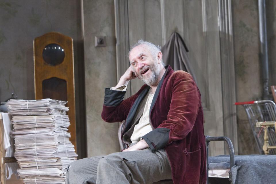 In this undated image released by the Brooklyn Academy of Music, actor Jonathan Pryce is shown during a performance of "The Caretaker," in New York. (AP Photo/BAM, Shane Reid)