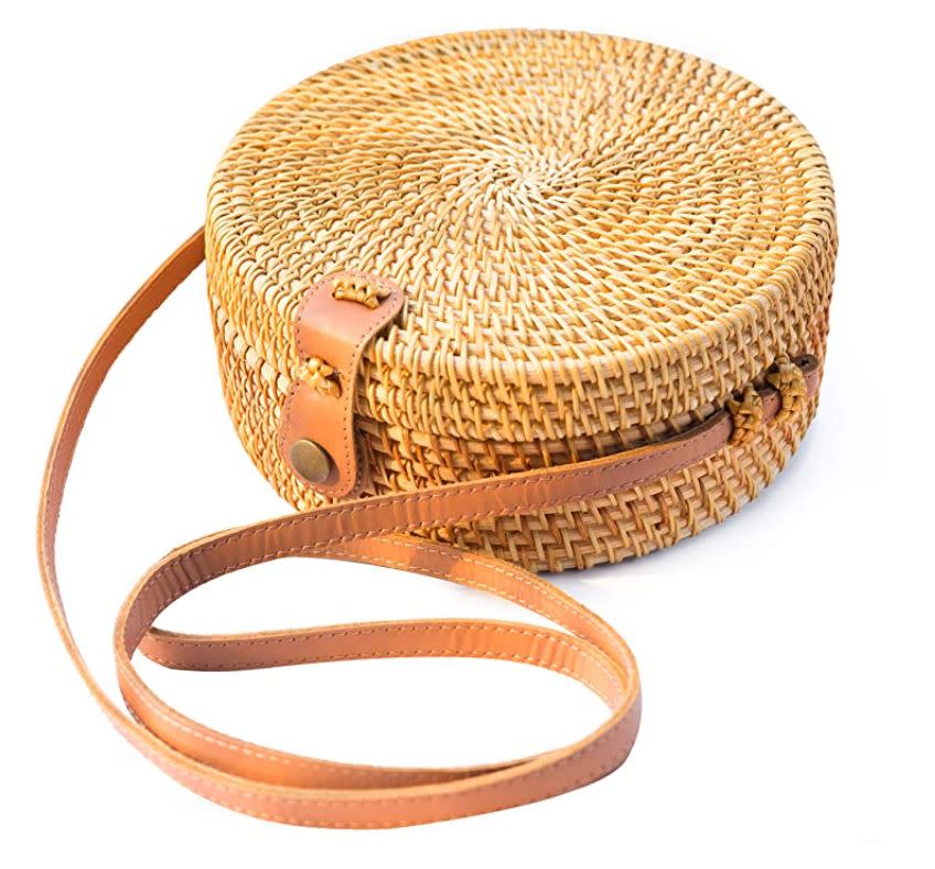 "I got this adorable <a href="https://amzn.to/2X7vZCR" target="_blank" rel="noopener noreferrer">handwoven rattan crossbody bag</a> during the <a href="https://www.huffpost.com/entry/amazons-style-sale-just-dropped-best-deals_l_5eeb7b16c5b6b17dd30ada84" target="_blank" rel="noopener noreferrer">Amazon Big Style Sale</a> and I'm obsessed with it! It's super lightweight but has enough room for bulkier items like sunglasses, hand sanitizer, a phone and more. It has an adjustable strap for on the shoulder and crossbody styling, while the magnetic snap closure keeps all of my items secure. I've gotten so many compliments on it and will be wearing it well into August." - <strong>Danielle Gonzalez, Associate Commerce Editor<br /></strong><br /><a href="https://amzn.to/2X7vZCR" target="_blank" rel="noopener noreferrer">Find it for $27 at Amazon</a>.