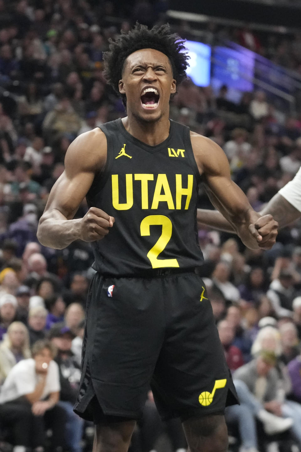 Utah Jazz guard Collin Sexton reacts after scoring against the Milwaukee Bucks during the first half of an NBA basketball game Sunday, Feb. 4, 2024, in Salt Lake City. (AP Photo/Rick Bowmer)