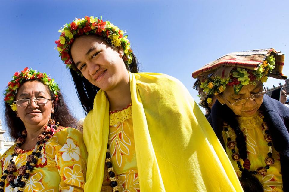 <span class="caption">Hawaiian pilgrims attend a 2009 ceremony at the Vatican to canonize five new saints, including Father Damien.</span> <span class="attribution"><a class="link " href="https://www.gettyimages.com/detail/news-photo/hawaian-pilgrims-attend-pope-benedict-xvis-a-new-saints-news-photo/527601302?adppopup=true" rel="nofollow noopener" target="_blank" data-ylk="slk:Alessandra Benedetti/Corbis Historical via Getty Images;elm:context_link;itc:0;sec:content-canvas">Alessandra Benedetti/Corbis Historical via Getty Images</a></span>
