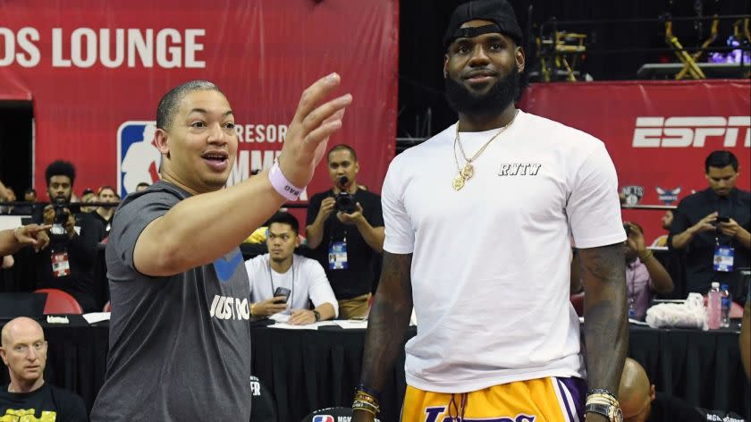 LAS VEGAS, NV - JULY 15: Head coach Tyronn Lue (L) of the Cleveland Cavaliers talks with LeBron James of the Los Angeles Lakers after a quarterfinal game of the 2018 NBA Summer League between the Lakers and the Detroit Pistons at the Thomas & Mack Center on July 15, 2018 in Las Vegas, Nevada. NOTE TO USER: User expressly acknowledges and agrees that, by downloading and or using this photograph, User is consenting to the terms and conditions of the Getty Images License Agreement. (Photo by Ethan Miller/Getty Images) ** OUTS - ELSENT, FPG, CM - OUTS * NM, PH, VA if sourced by CT, LA or MoD **