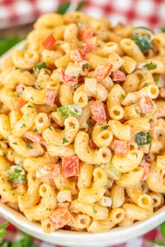 <p>Plain Chicken</p><p>Sure to be a hit at every summer cookout you take it to.</p><p><strong>Get the recipe: <a href="https://www.plainchicken.com/bbq-macaroni-salad/" rel="nofollow noopener" target="_blank" data-ylk="slk:BBQ Macaroni Salad;elm:context_link;itc:0;sec:content-canvas" class="link rapid-noclick-resp">BBQ Macaroni Salad</a></strong></p>