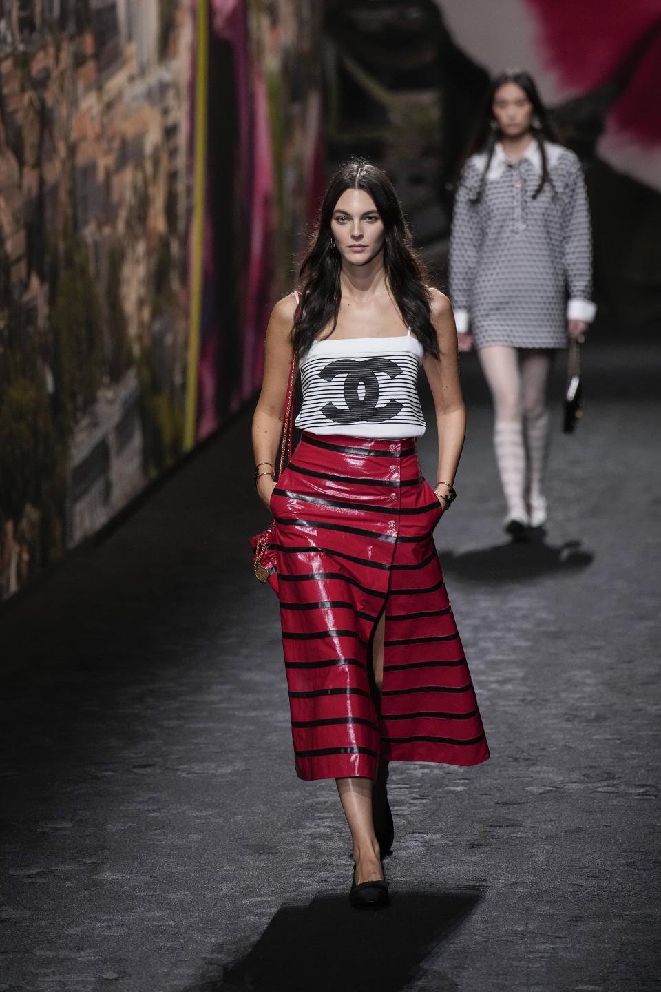 Vittoria Ceretti wears a creation for the Chanel Spring/Summer 2024 womenswear fashion collection presented Tuesday, Oct. 3, 2023 in Paris. (AP Photo/Christophe Ena)