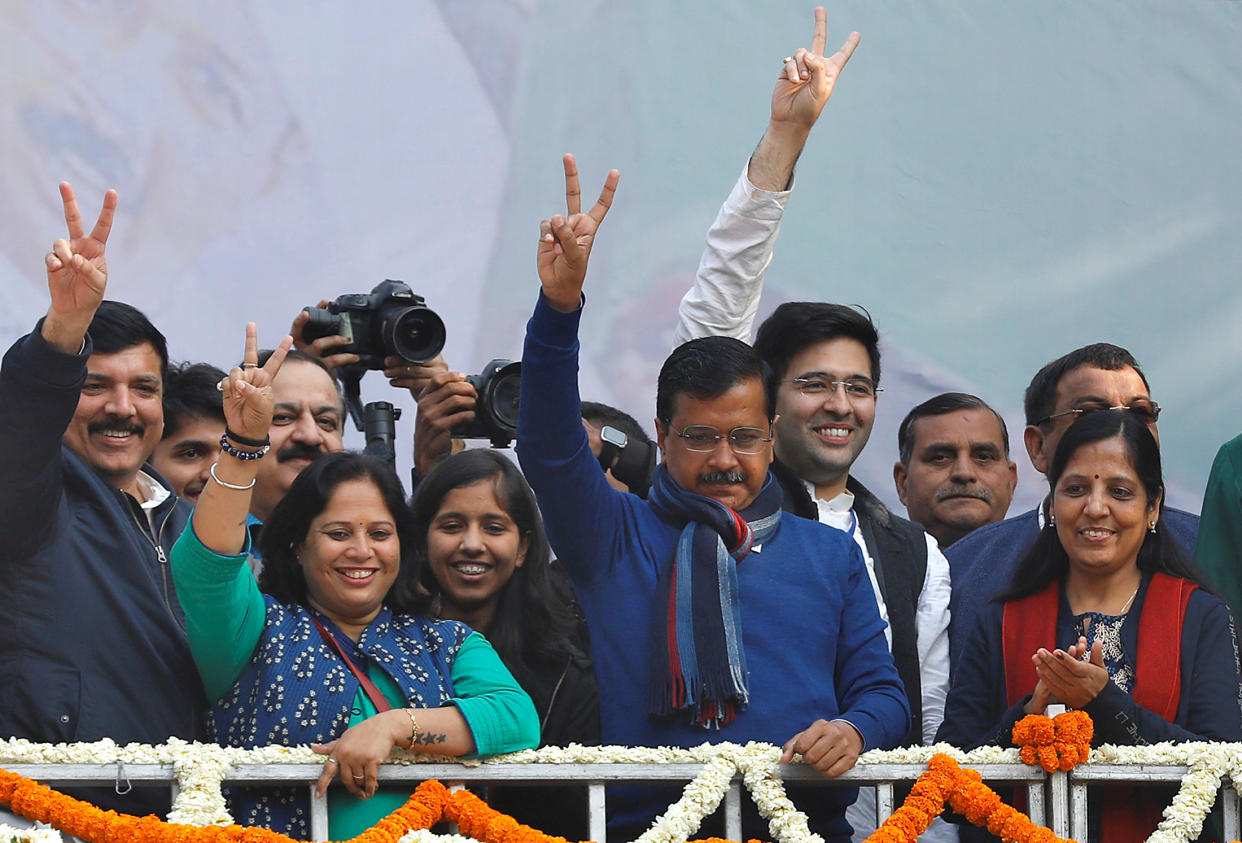 Delhi Chief Minister and leader of Aam Aadmi Party (AAP) Arvind Kejriwal gestures towards his supporters during celebrations at the party headquarters in New Delhi, India, February 11, 2020. REUTERS/Anushree Fadnavis