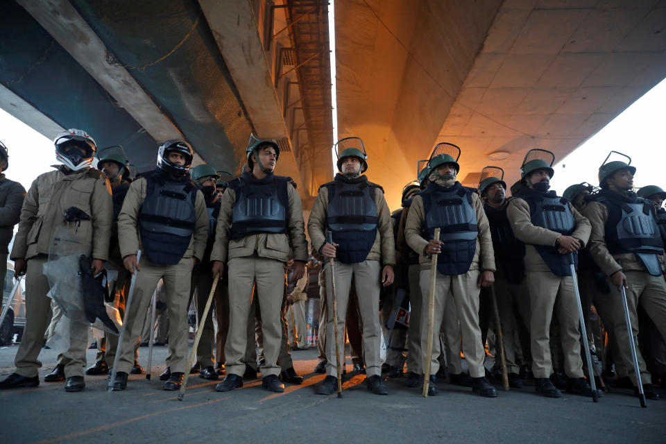 Police in riot gear keep watch during a protest against a new citizenship law, in Seelampur area of Delhi, India, December 20, 2019. REUTERS/Danish Siddiqui