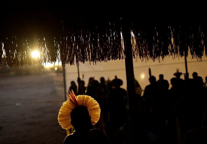 An indigenous man attends a four-day pow wow in Piaracu village, in Xingu Indigenous Park, near Sao Jose do Xingu, Mato Grosso