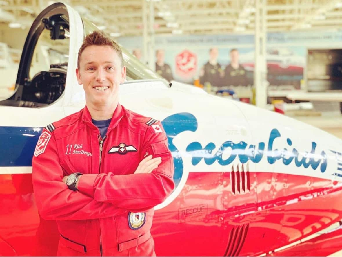 Capt. Richard MacDougall is performing with the Snowbirds again, from the ground for now, as a narrator at their aerobatic shows. (Submitted by Royal Canadian Air Force - image credit)