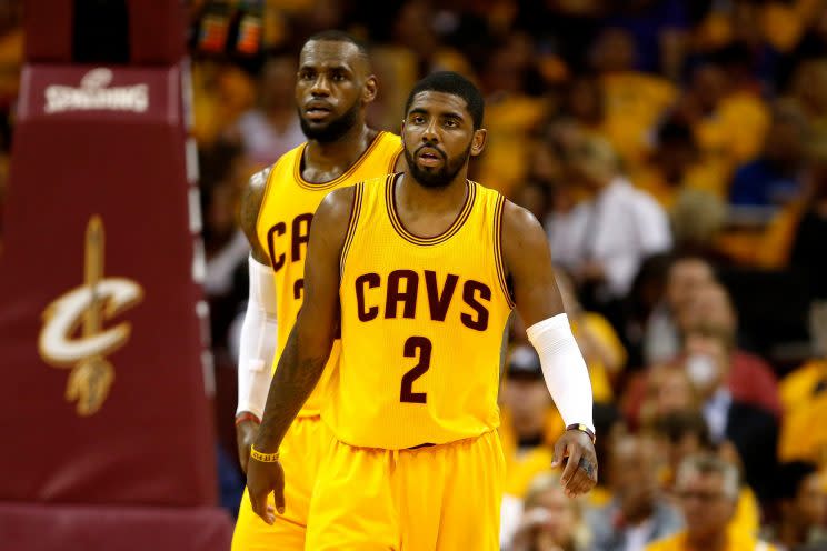 Cleveland Cavaliers All-Star guard Kyrie Irving, right, talks with