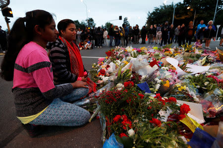 People gather at a memorial to pay tribute to victims of the mosque attacks outside Masjid Al Noor in Christchurch, New Zealand, March 16, 2019. REUTERS/Jorge Silva