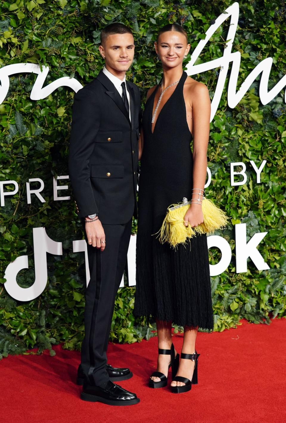 Romeo Beckham and Mia Regan attending the Fashion Awards 2021 (PA)