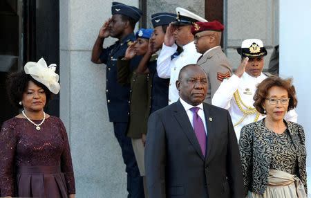 President Cyril Ramaphosa, accompanied by his wife Tshepo Motsepe, arrive to deliver the State of the Nation address at Parliament in Cape Town, South Africa, February 16, 2018. REUTERS/Nasief Manie/Pool