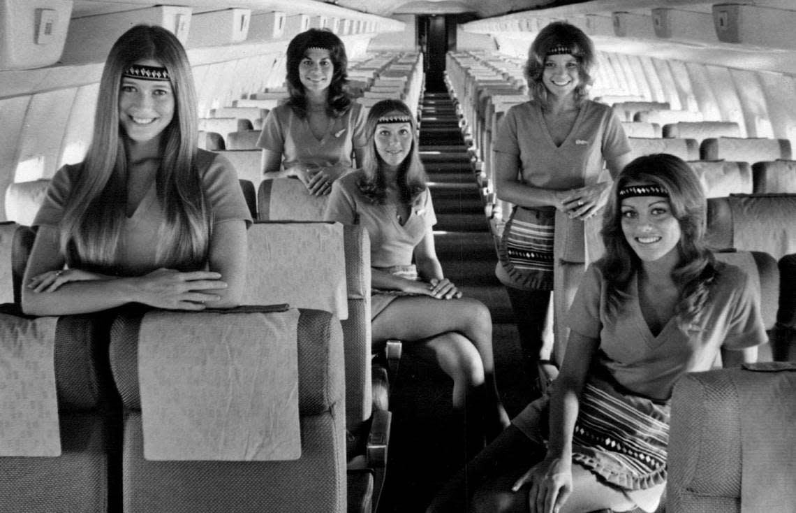 In 1972, flight attendants are ready to welcome travelers aboard an Air Florida 707 flight. The flight attendants are, from left, Vicky Smith, Nancy Lancaster, Pat Rice, Connie Harper and Donna Wolson.