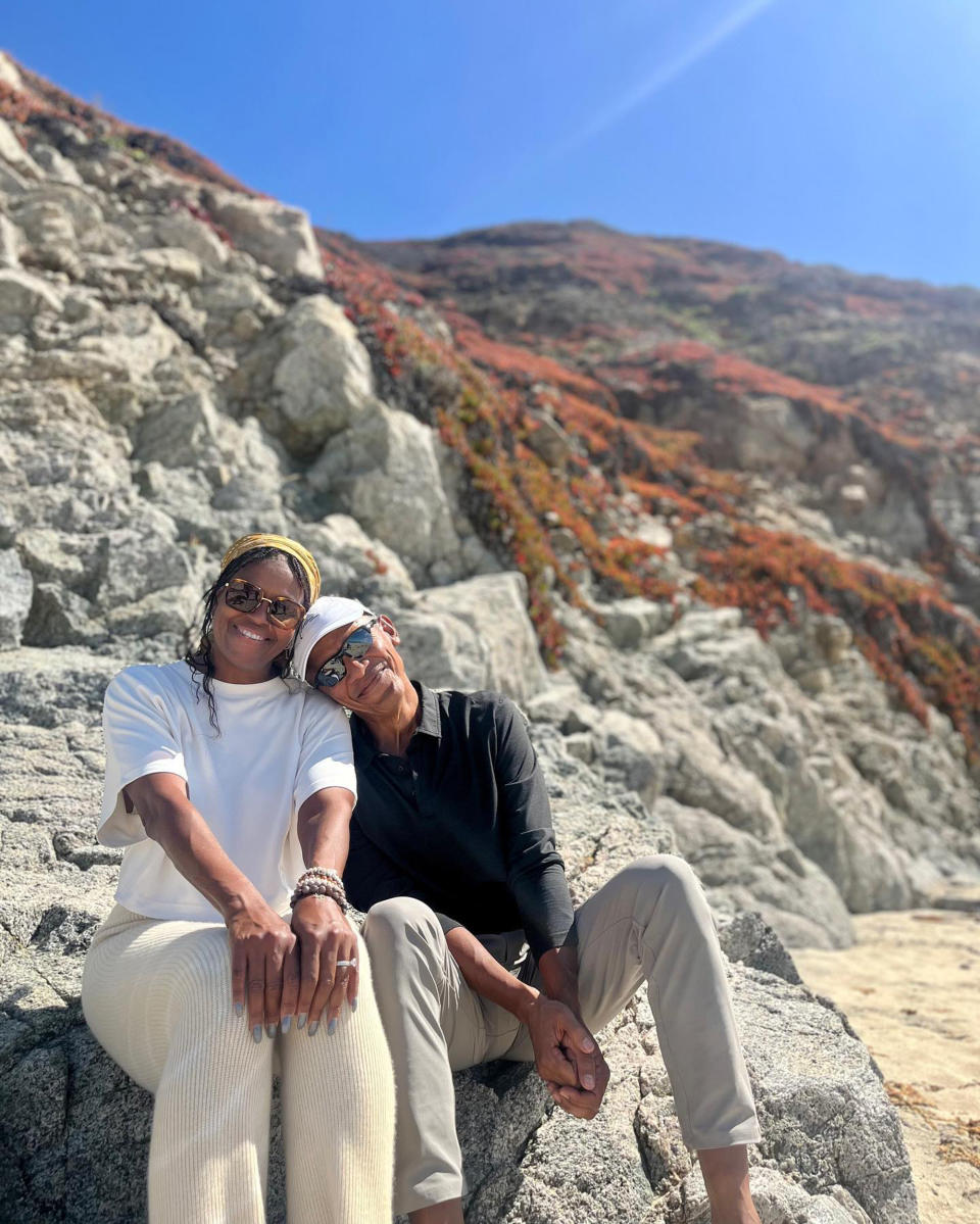 Barack Obama and Michelle Obama pose for a picture on the beach (@barackobama via Instagram)