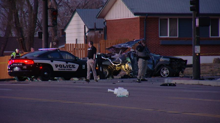 Deputies investigate a crashed vehicle from a crash involving Colorado Springs Police