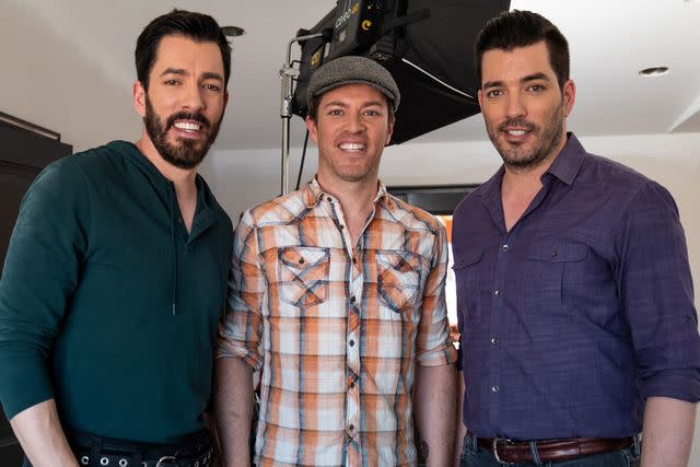 <p>Jonathan Scott Instagram </p> Drew and Jonathan Scott with their brother J.D. Scott.