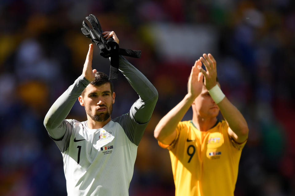 <p>The Australia players take the applause at full-time </p>