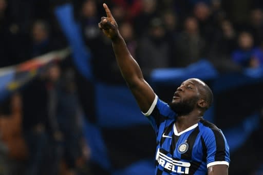 Striker's salute: Inter Milan's Romelu Lukaku celebrates after opening the scoring