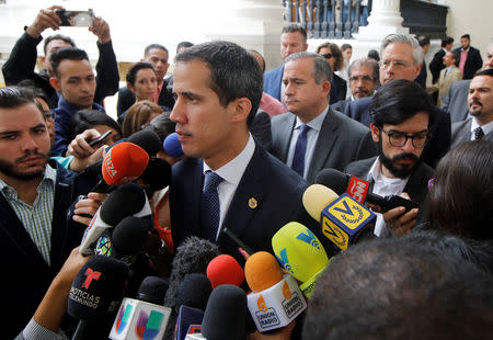Venezuelan opposition leader Juan Guaido, who many nations have recognized as the country's rightful interim ruler, attends a news conference with accredited diplomatic representatives of the European Union in Caracas, Venezuela February 19, 2019. REUTERS/Marco Bello