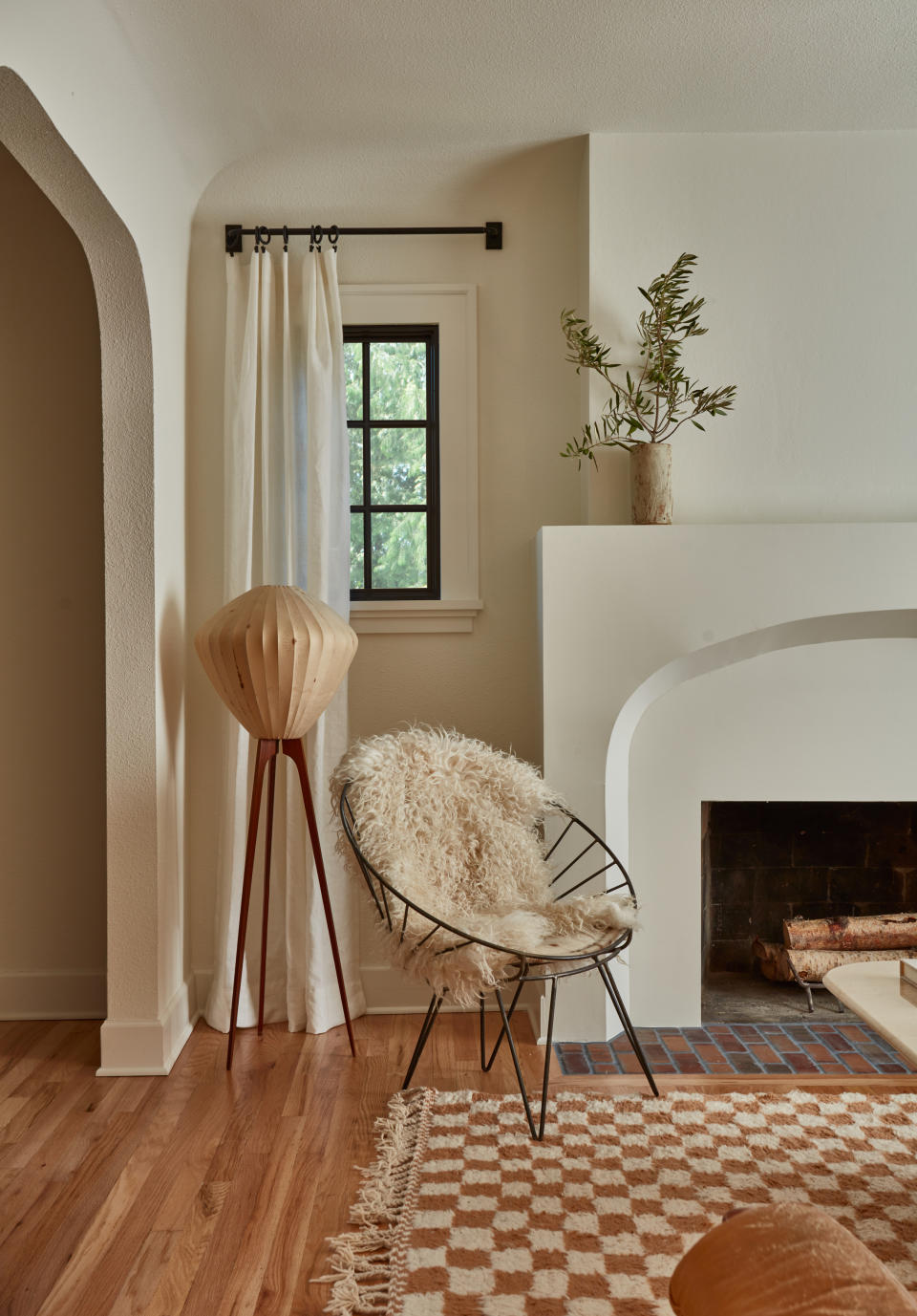 A living room with a textured rug