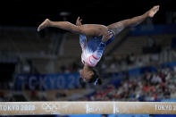 Simone Biles, of the United States, performs on the balance beam during the artistic gymnastics women's apparatus final at the 2020 Summer Olympics, Tuesday, Aug. 3, 2021, in Tokyo, Japan. (AP Photo/Ashley Landis)