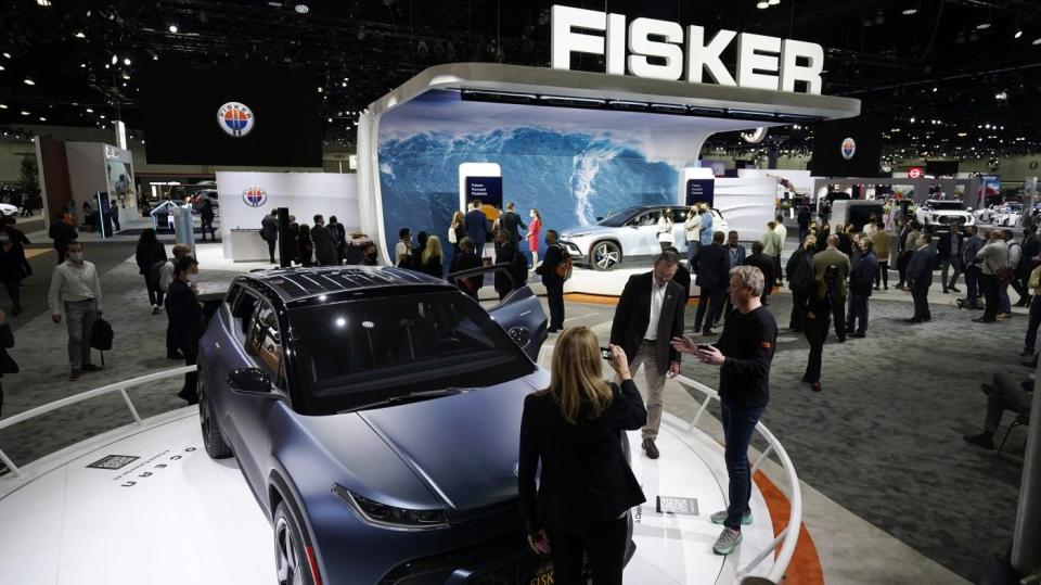 Fisker Inc. Chair and CEO Henrik Fisker shows his company’s new EV, the Ocean, at the AutoMobility LA Auto Show on Nov. 17, 2021, in Los Angeles. (AP Photo/Marcio Jose Sanchez)