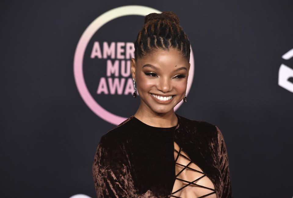 Halle Bailey arrives at the American Music Awards on Sunday, Nov. 21, 2021, at Microsoft Theater in Los Angeles. (Photo by Jordan Strauss/Invision/AP)