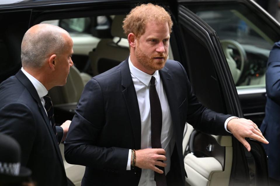 Harry leaving car outside court 