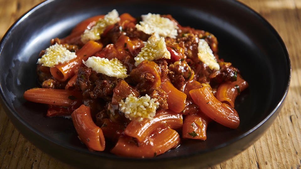 Red pepper rigatoni with duck sausage - Credit: Evan Sung