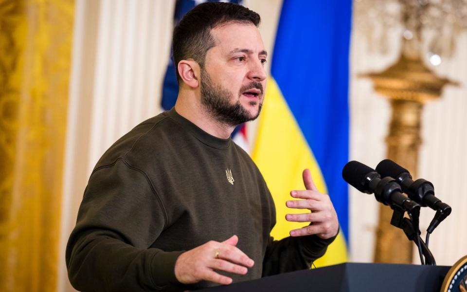 Volodymyr Zelensky and US President Joe Biden hold a press conference - Shutterstock