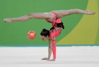 <p>Romania’s Ana Luiza Filiorianu performs during the rhythmic gymnastics individual all-around qualifications at the 2016 Summer Olympics in Rio de Janeiro, Brazil, Friday, Aug. 19, 2016. (AP) </p>