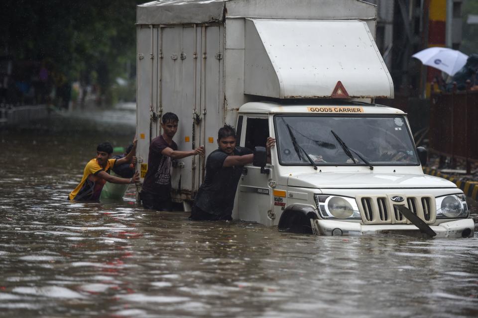 Photos: Record monsoon in India turns deadly