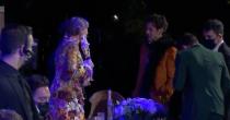 <p>Harry and Taylor reunited at the 2021 Grammy Awards in Los Angeles, and lip readers were alllll over it. Apparently the reunion was short and sweet, and Harry simply said "It was nice to see you" to Taylor. Got it!</p>