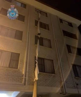 Australia man ties bedsheets together to escape 4th floor hotel quarantine - police