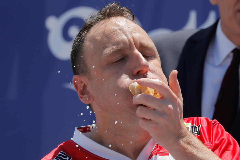 Joey Chestnut competes during Nathan's Famous Fourth of July Hot Dog-Eating Contest held at Maimonides Park in New York City, New York, U.S., July 4, 2021. REUTERS/Andrew Kelly