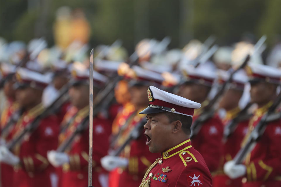 The commander of an honor guard shouts during a ceremony marking Myanmar's 76th anniversary of Independence Day in Naypyitaw, Myanmar, Thursday, Jan. 4, 2024. (AP Photo/Aung Shine Oo)