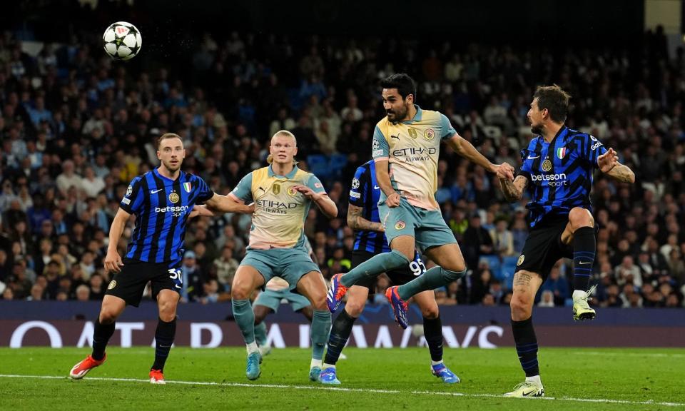 <span>Ilkay Gündogan puts his header straight into Yann Sommer’s hands in their 0-0 draw.</span><span>Photograph: Martin Rickett/PA</span>