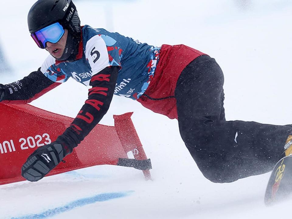 Arnaud Gaudet of Montcalm, Que., posted a bronze-medal finish in the men's parallel slalom small final at the snowboard world championships in Bakuriani, Georgia. (Alexis Boichard/Agence Zoom/Getty Images - image credit)