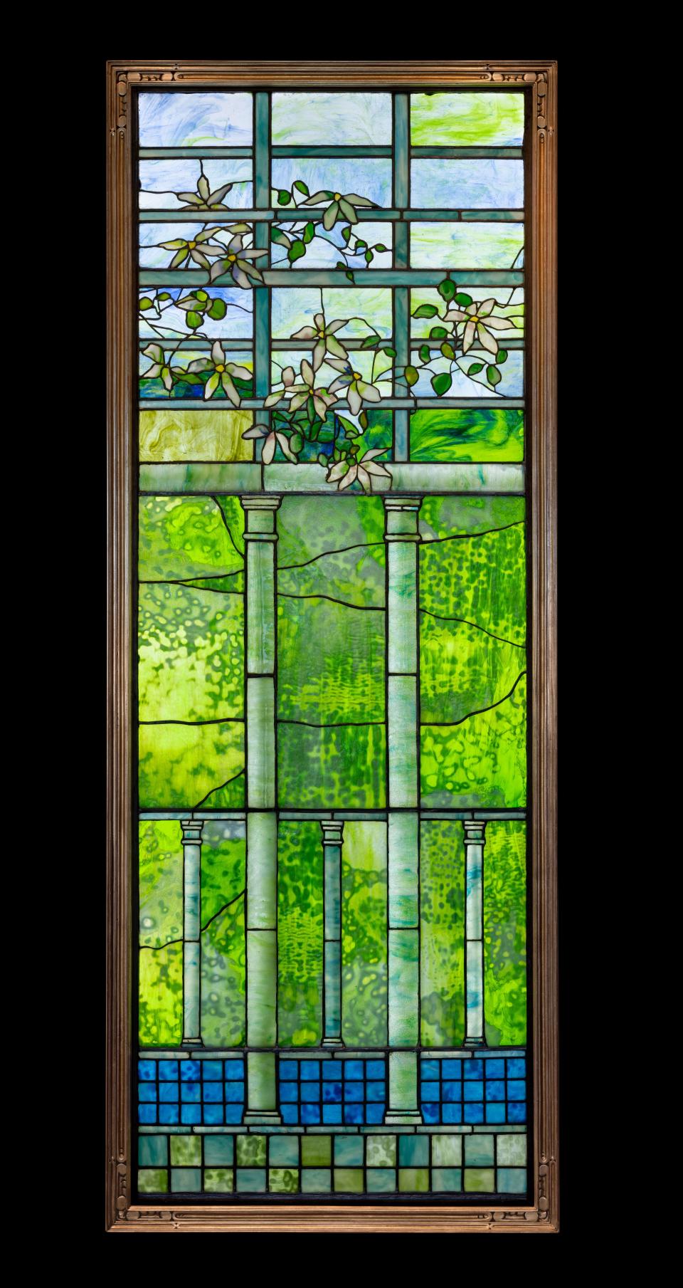 A Tiffany stained-glass window. Work by Louis Comfort Tiffany will be featured at Selby Gardens in 2023 in the exhibition “Tiffany: The Pursuit of Beauty in Nature.”