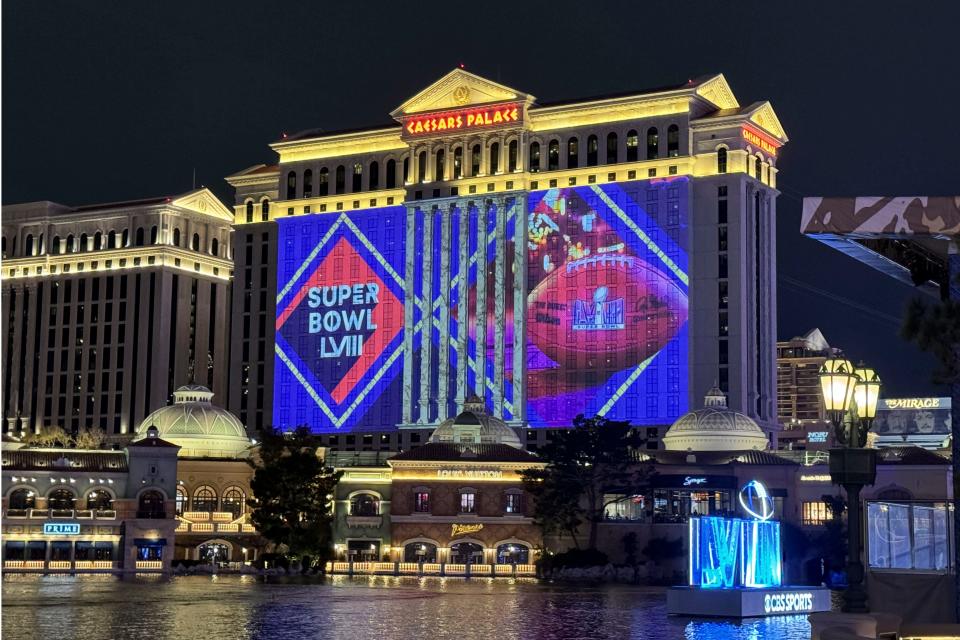 Super Bowl 58 graphics are projected onto Caesars Palace on the Las Vegas strip.