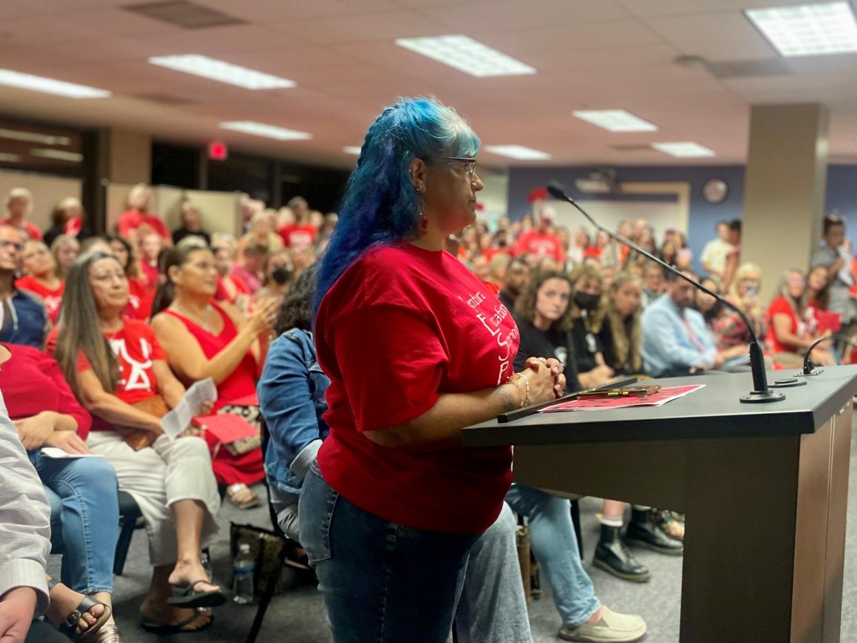 Paula Barone, a special education aide at Cabrillo Middle School, speaks Tuesday, Sept. 13, 2022 during a Ventura Unified School District board meeting packed with protesting school staff and teachers.