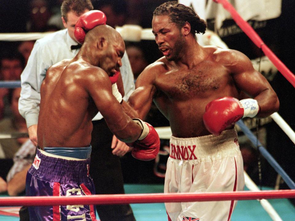 Evander Holyfield and Lennox Lewis