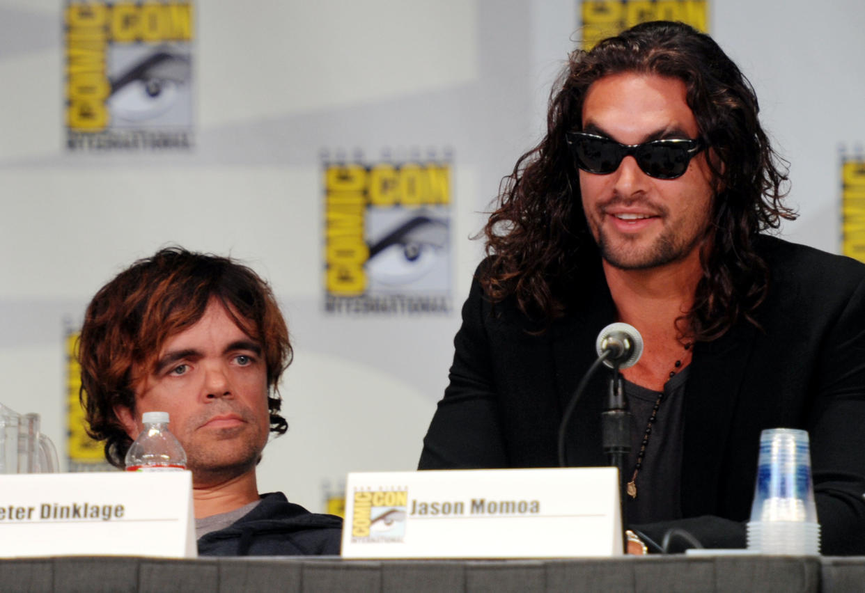 SAN DIEGO, CA - JULY 21:  Actors Peter Dinklage and Jason Momoa speak at HBO's "Game Of Thrones" Panel during Comic-Con 2011 on July 21, 2011 in San Diego, California.  (Photo by Frazer Harrison/Getty Images)