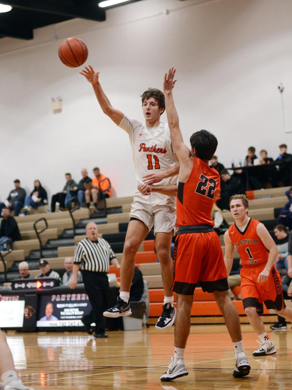 New Lexington's Lukas Ratliff passes the ball during the first half of a win against visiting Nelsonville-York last season. Ratliff headlines a strong returning core for the Panthers, who should battle for the MVL Small School title.