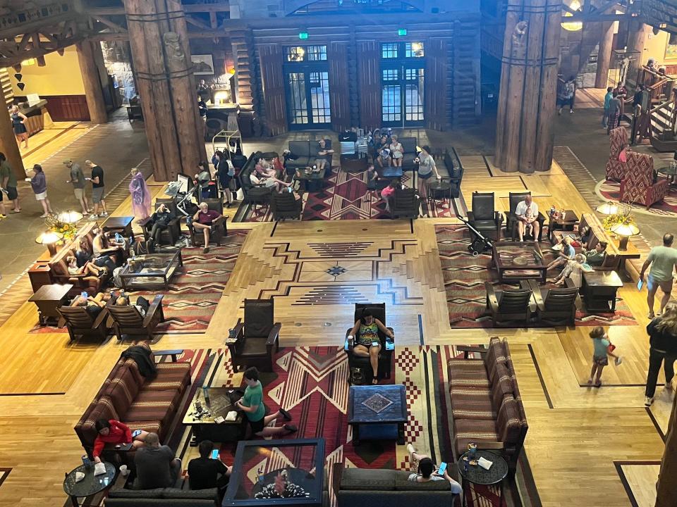 people working in lodge lobby during hurricane ian in disney