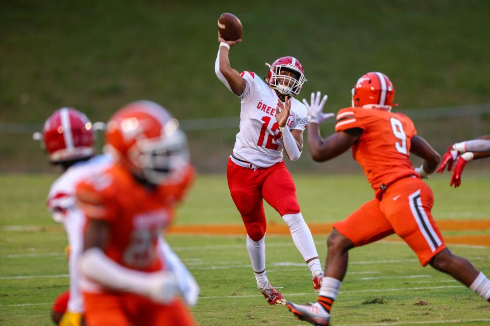 Greenville High's Bryson Drummond(12)  passes the ball down the fieldl at Mauldin High School on Friday, Sept. 9, 2022. 